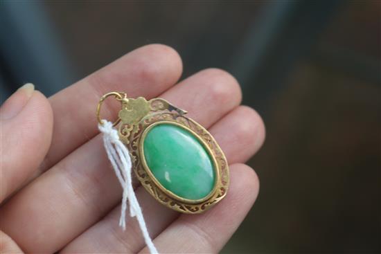 A Chinese gold framed jade pendant, in a Tessier box